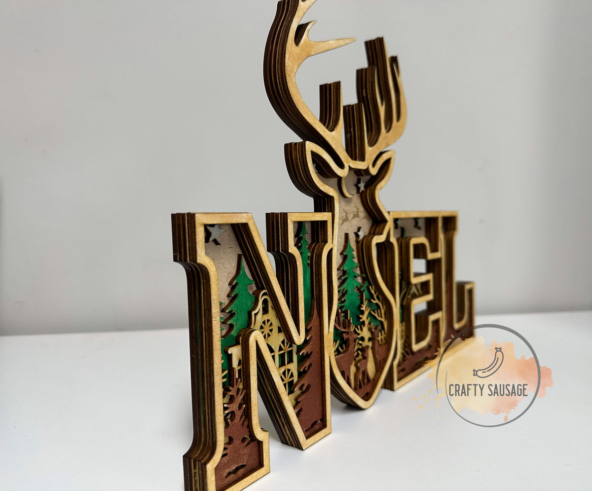 Layered Wooden “NOEL” Sign — 5-Layer Woodland Stag Design